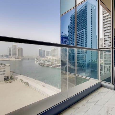 Take in captivating city views over the Dubai canals