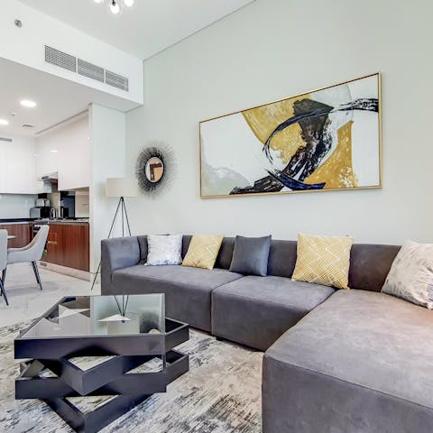 Stretch out in the living area after a day of exploring the city