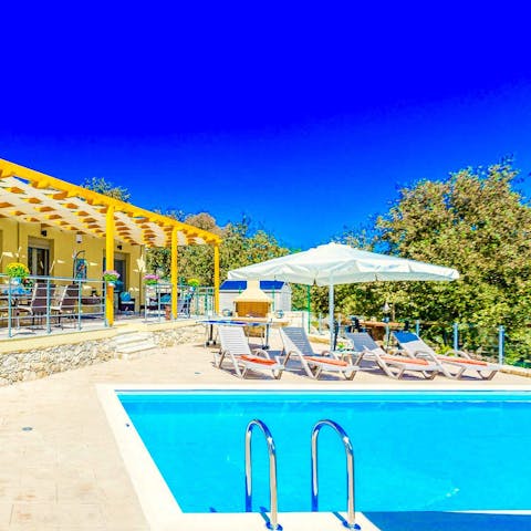 Jump into the private pool to cool off from the Cretan sun