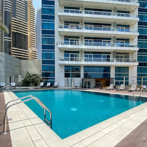 Laze on loungers in the sun or shade before luxuriating in the outdoor, communal pool