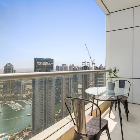 Sit out on the glass-fronted balcony for mesmerising Dubai Marina views