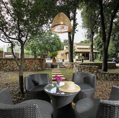 Sip on your morning coffee while you listen to bird song from the woodland seating area