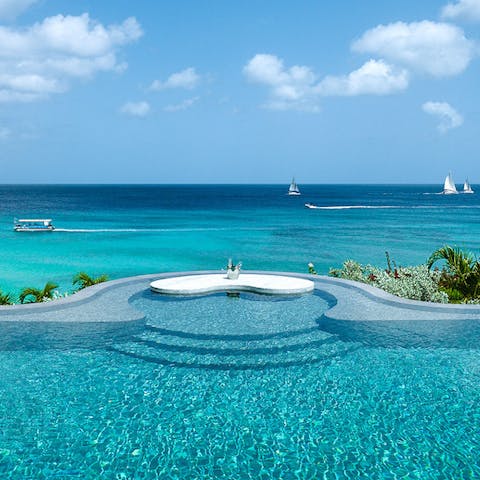 Take a dip in the pool and watch the boats go by