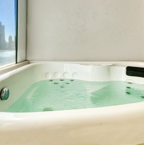 Sink into the private hot tub and unwind