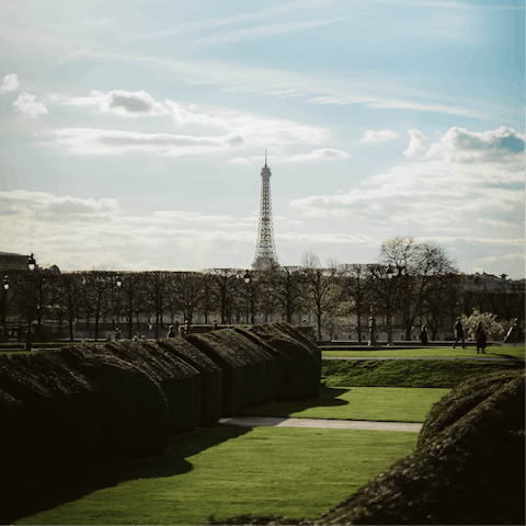 Stroll to Tuileries Garden with a coffee to take in the view