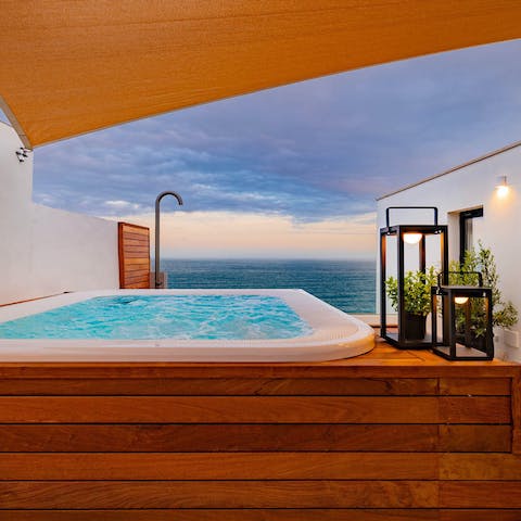 Watch the sunset, sundowner in hand, from the comfort of your home's rooftop jacuzzi