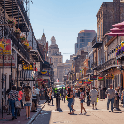 Soak up Bourbon Street's vibrant atmosphere, a twenty-minute walk away or six minutes away by car