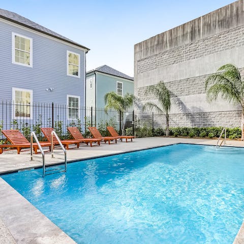 Spend a sunny afternoon lounging by the communal pool