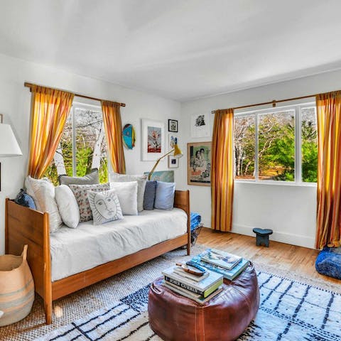 Curl up with a book and get cosy, admiring the leaves and greenery outside