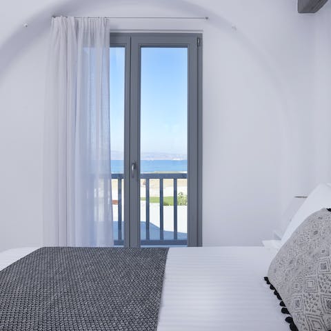 Wake up to views of the Aegean Sea from big windows