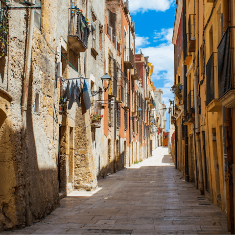 Explore the charming streets of nearby Tarragona