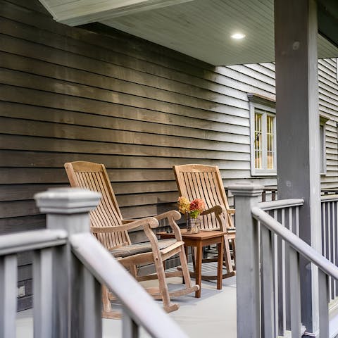 Rock on the porch as you enjoy the quiet of nature that surrounds you