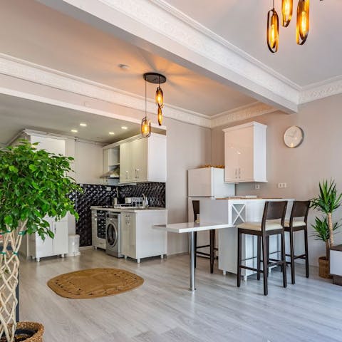 Cook up some tasty Turkish dishes in the sleek kitchen