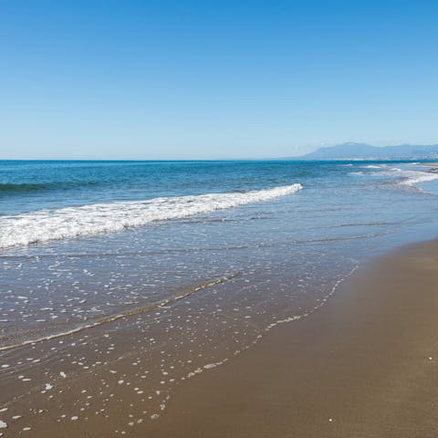 Go for a stroll to the golden sands of Calahonda Beach