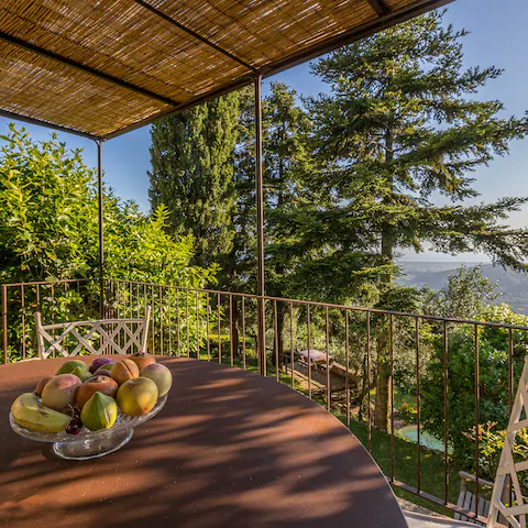 Gaze out over the rolling Tuscan hills from your private patio