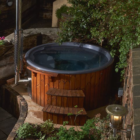 Soak under the stars in your own private wood-fired hot tub