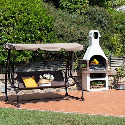 Unwind with a glass of wine while the barbecue heats up