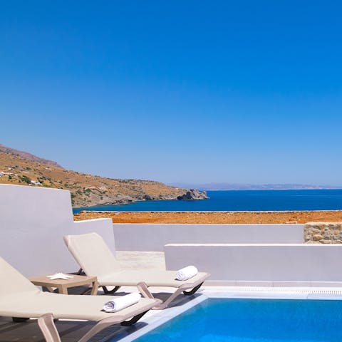 Relax on your sunloungers or have a dip in the pool while taking in views of the Aegean
