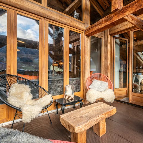 Enjoy a romantic après ski on the terrace overlooking the mountains of Morzine