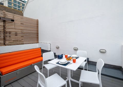 Enjoy your fish and chips alfresco in the home's courtyard