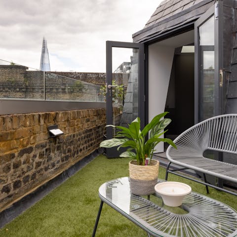 Sit back on the roof terrace and enjoy the view of the Shard