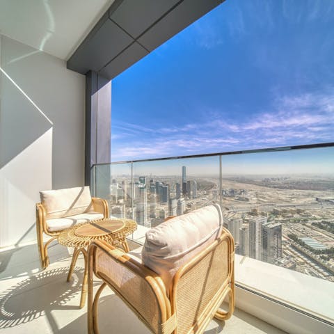 Admire cityscape views from the private balcony