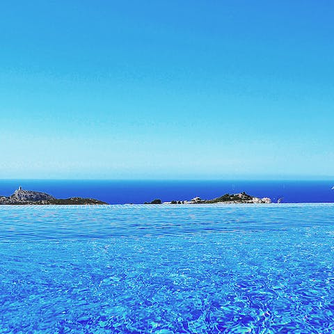 Take in the sea view from the infinity pool