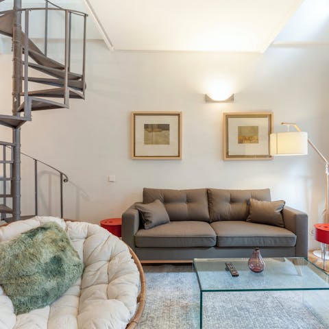 Relax with a glass of wine on the sofa after a fun day in Madrid