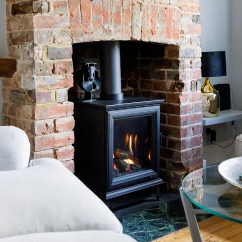 Get a fire going in the gas stove for cosy nights in