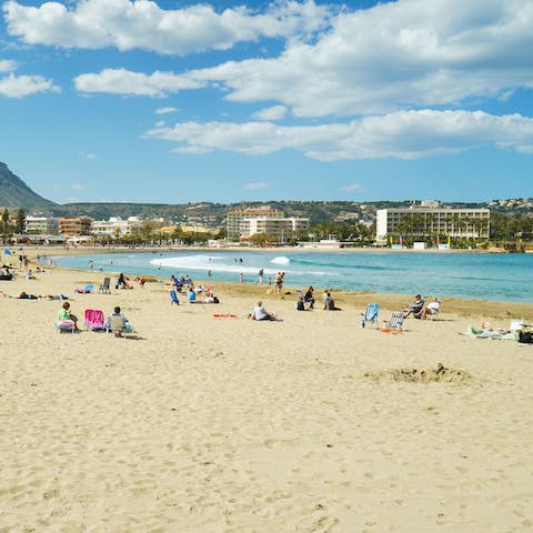 Slap on your sun cream and take the fifteen-minute stroll to Arenal Beach