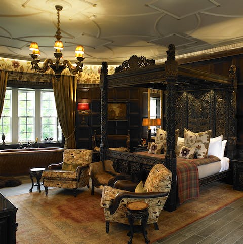 Tuck into a restful night in one of the hand-carved oak beds