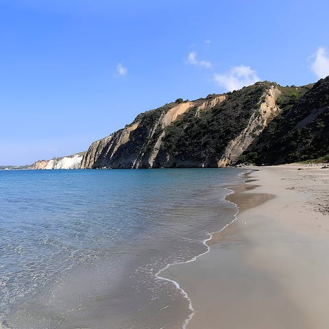 Spend a day on the white sands of Spasmata Beach, a short walk away