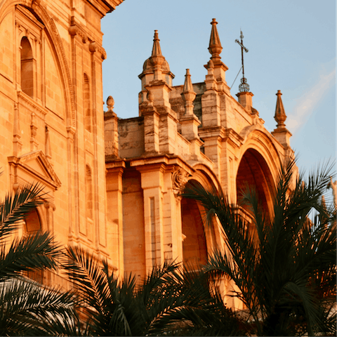 Visit the striking Granada Cathedral, located around a fifteen-minute walk from your apartment