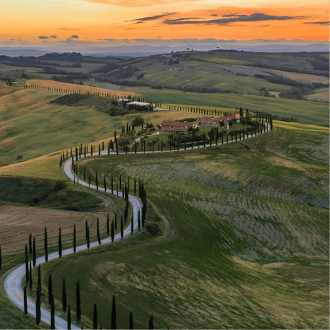 Wind your way through olive groves and rolling hills to this home in the Tuscan countryside 