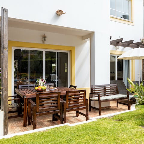 Enjoy the fresh air on the patio, the perfect spot to dine alfresco and lounge in the sun