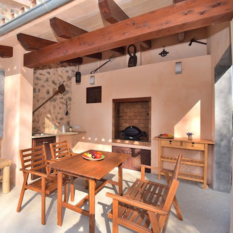 Try your hand at cooking some Mallorca delicacies in the outdoor kitchen
