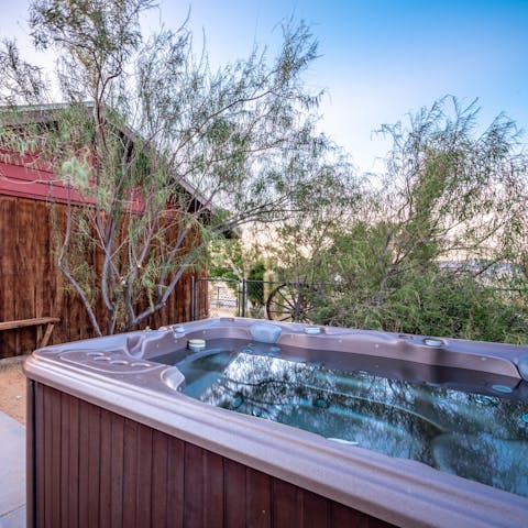 The hot tub is made for dips under the stars