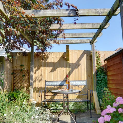 Have a sunset aperitif in the garden