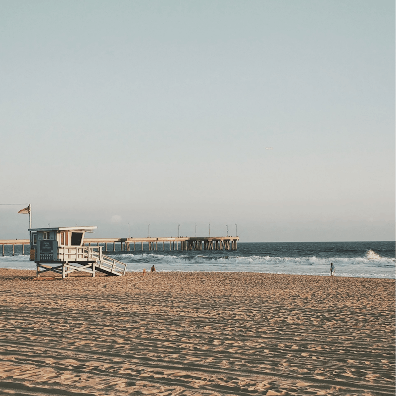Plunge into the Pacific and soak up the sun on Venice's golden sands – a ten-minute walk away