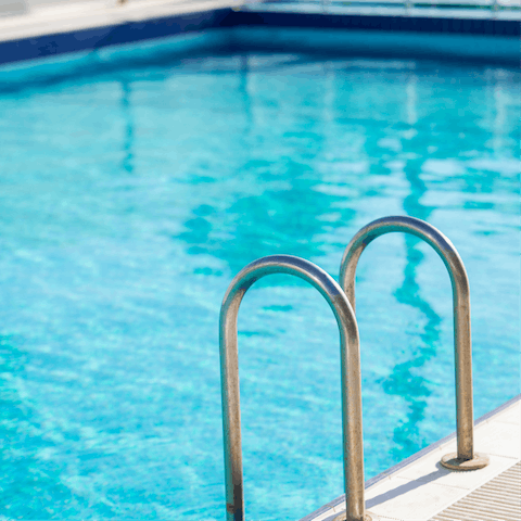 Beat the heat with a refreshing dip in the communal outdoor pool