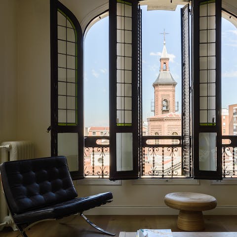 Admire views of the Parroquia de Nuestra Señora de los Dolores from the living room's beautiful arched window
