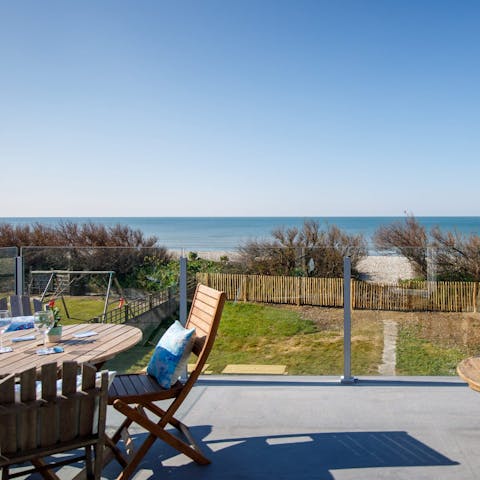 Gather out on the private patio for family feasts with stunning sea views 