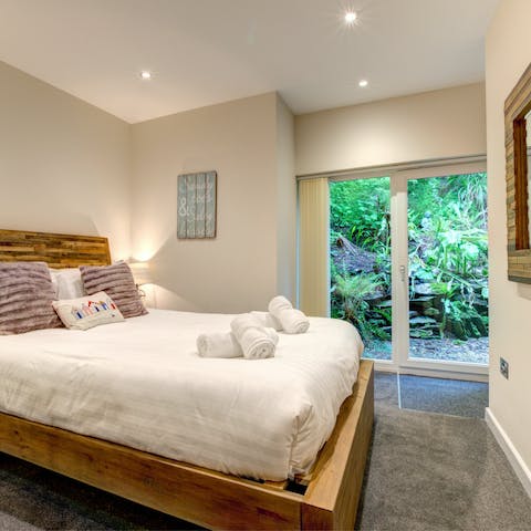 Wake up to the sight of soothing greenery just outside the master bedroom