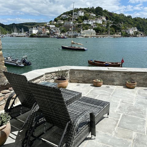 Relax on the terrace and admire the stunning view of the River Dart