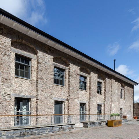 Stay in part of a Grade II listed former paper mill, bakery, pottery and brewery