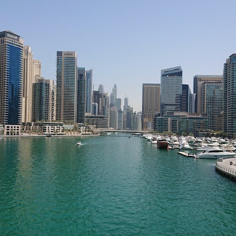 Explore the sparkling Dubai Marina district with its scenic promenade and plethora of shops and restaurants
