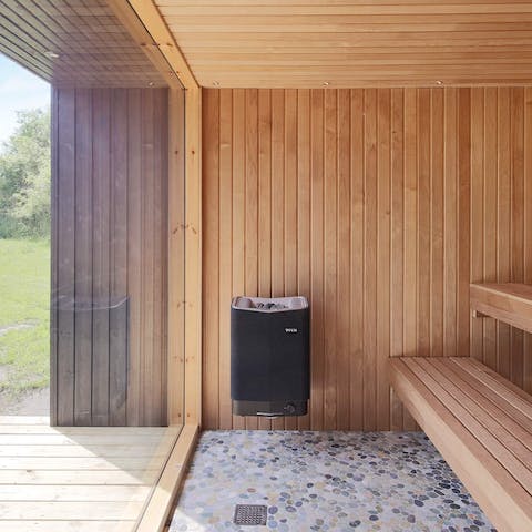 Let go of your stresses in the private glass-fronted sauna