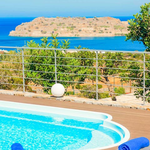Soak up the views of Spinalonga Island from your poolside lounger