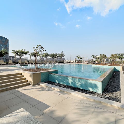 Have a dip in the shared pool to cool off from the Dubai sun