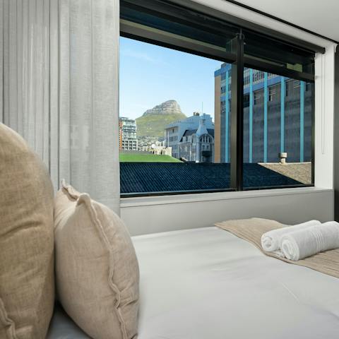 Take in the mountain views from the bed
